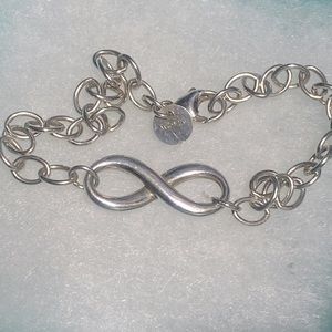 Tiffany & Co. silver infinity bracelet.